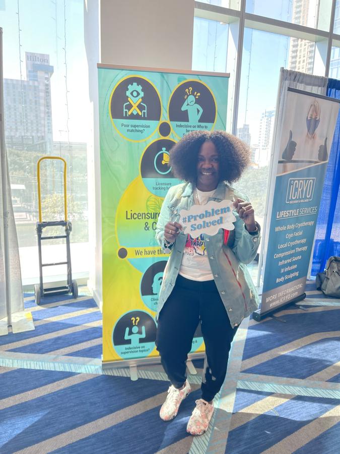 Happy customer at the LaMé Essentials booth, TCA
