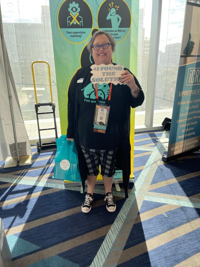 Happy customer at the LaMé Essentials booth, TCA